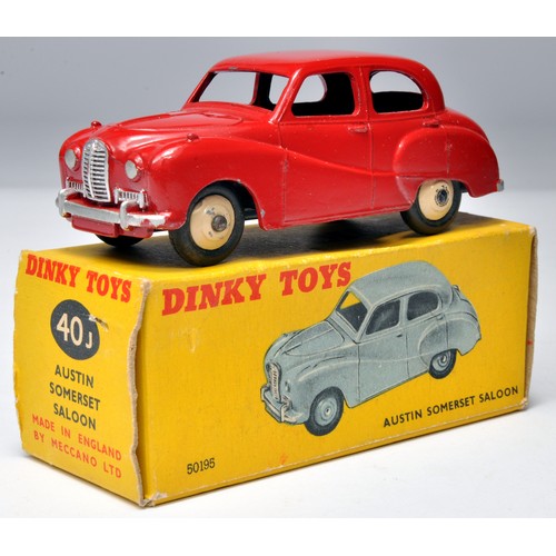 Dinky No. 40j Austin Somerset Saloon. Single issue in red with CREAM hubs. (40j to base). Displays generally very good to excellent. The odd minor mark. In good to very good (40j) box. Hard to find variation.