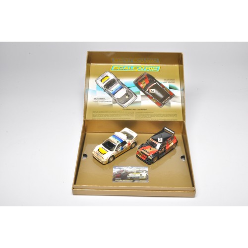 A boxed Scalextric set. Individual models comprise 1) Classic ...