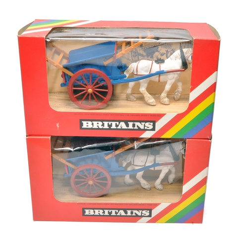 16 - Britains 1/32 Farm Toys comprising duo of Horse Drawn Farm Carts. Contents generally very good to ex... 
