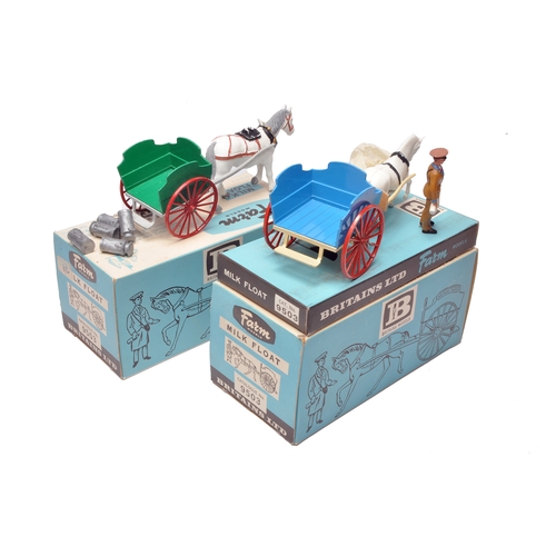 17 - Britains 1/32 Farm Toys comprising duo of No. 9503 Milk Floats. Colour variations as shown. Contents... 