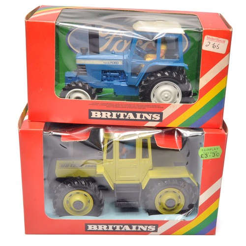 39 - Britains 1/32 Farm Toys comprising No. 9523 Ford TW20 Tractor PLUS No. 9525 MB Trac 1500. Contents e... 