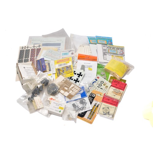 A selection of Plastic Model Kit decals and after market components.