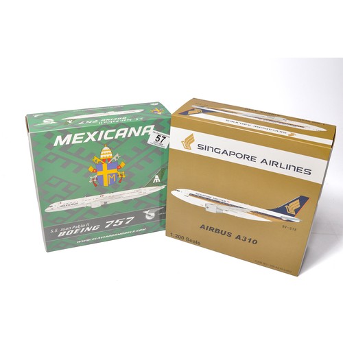 57 - A duo of diecast model aircraft  1/200 scale issues comprising 1) Singapore Airlines Airbus A310, 2)... 