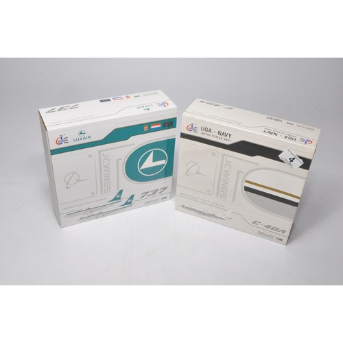 4 - A duo of diecast model aircraft  1/200 scale issues comprising 1) JC Wings Luxair Boeing 737-500, 2)... 