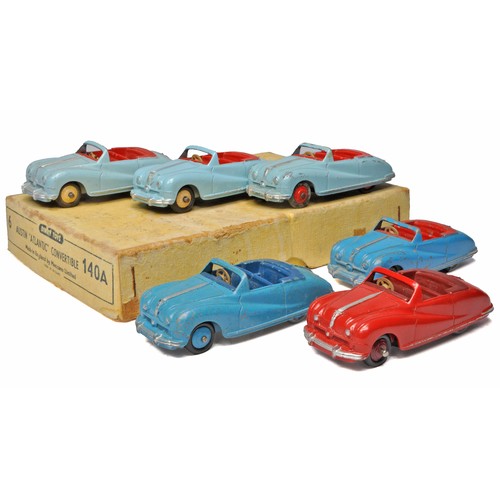 Dinky Trade Box - No. 140A Austin 'Atlantic' Convertible. 6 Harder to Find Examples in various colours, as shown. Includes Very SCARCE Blue, Dark Blue interior and Blue Hubs PLUS Red, Maroon Interior and Maroon Hubs. Conditions of contents vary good to very good, as shown. Trade box displays generally fair to good, with dividers.