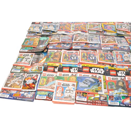 629 - A large collection of mostly LEGO Star Wars (plus other themes) Magazines to also include attached b... 