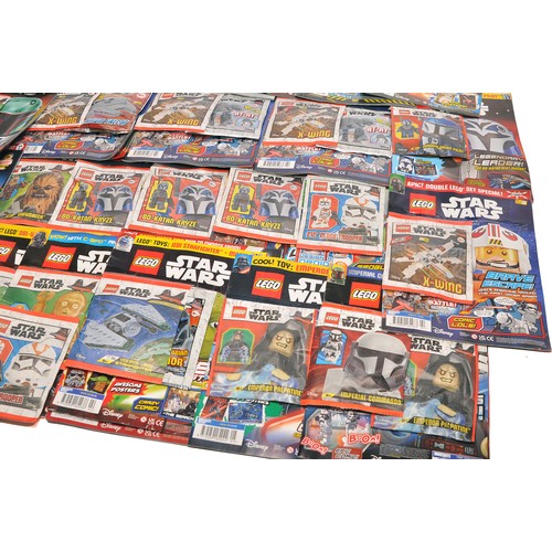 629 - A large collection of mostly LEGO Star Wars (plus other themes) Magazines to also include attached b... 