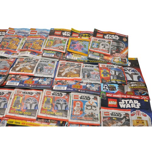 629 - A large collection of mostly LEGO Star Wars (plus other themes) Magazines to also include attached b... 