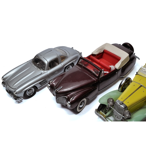 196 - A group of Franklin Mint diecast classic cars including a Mercedes-Benz 300SL coupe and a Chevrolet ... 