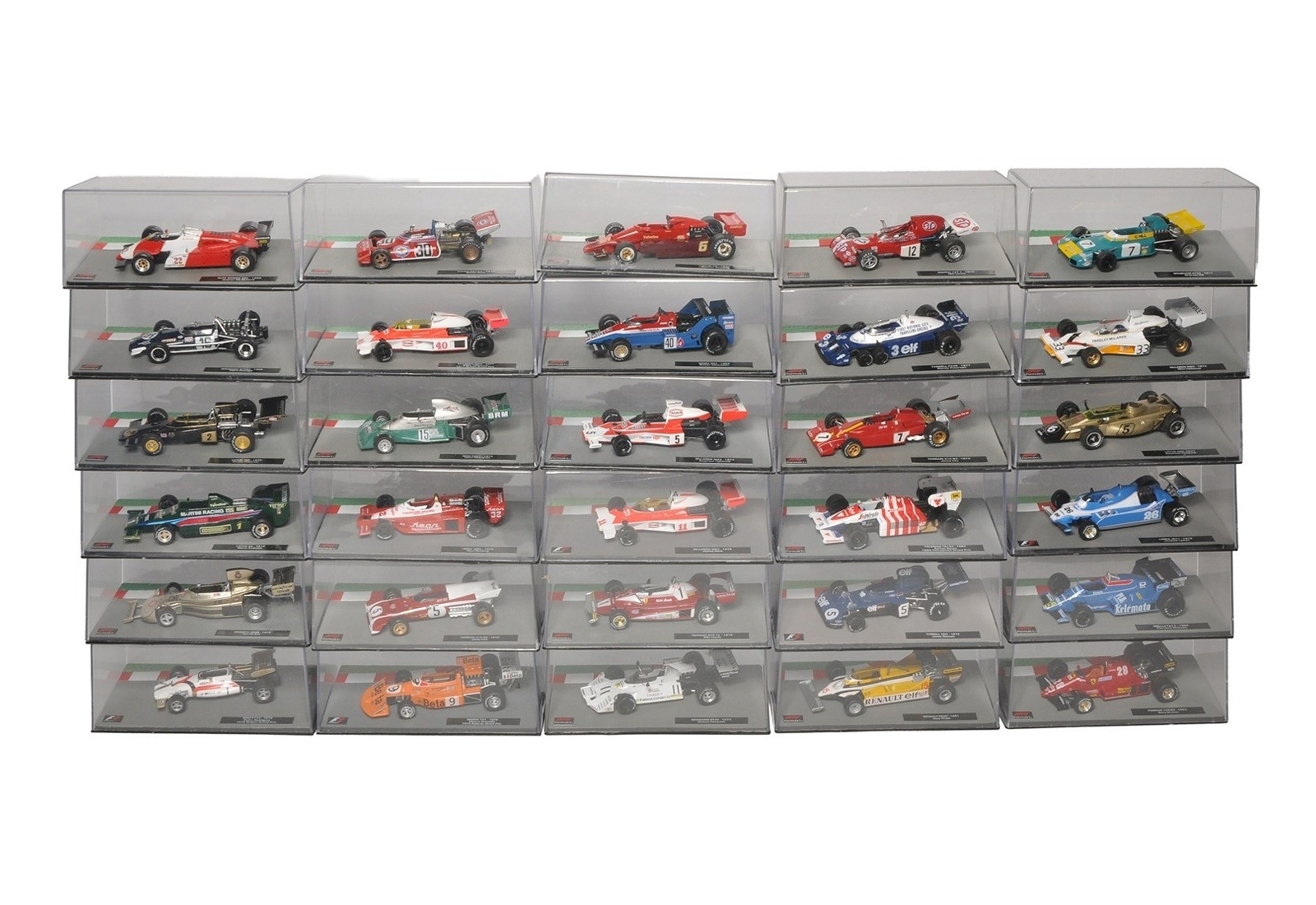A collection of diecast Formula 1 model racing cars, each housed in an ...