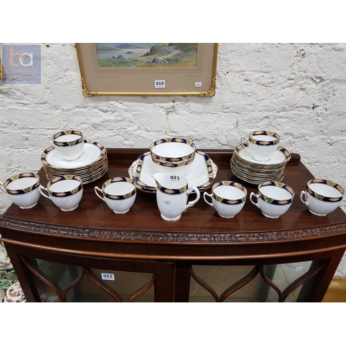 21 - ANTIQUE CHINA TEASET