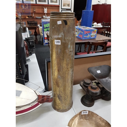 140 - LARGE BRASS MILITARY SHELL