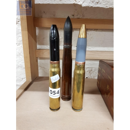 54 - 3 LARGE SPENT BULLET SHELLS