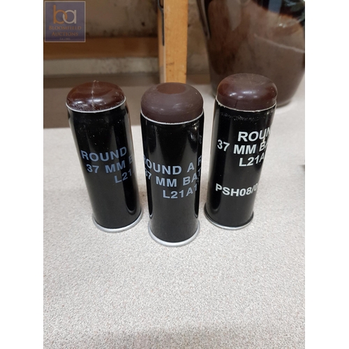 63 - 3 RUBBER BATON ROUNDS