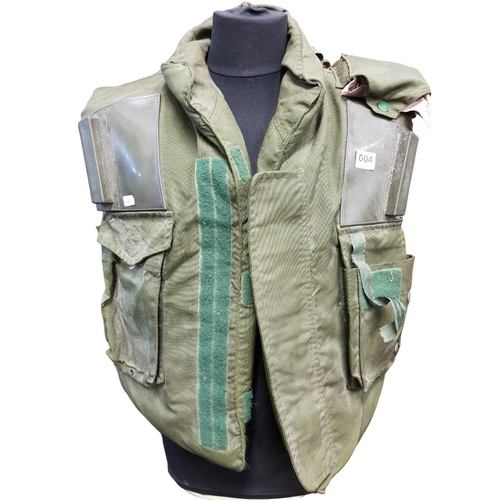 4 - COMBAT BODY ARMOUR WITH FIRST AID KIT IN POCKET