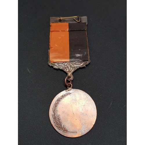 393 - BLACK AND TAN MEDAL WITH COMRAC BAR - UNNAMED AND TIE CLIP IN ORIGINAL BOX