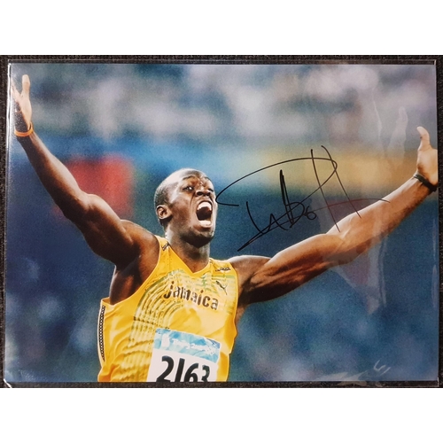 203 - USAIN BOLT SIGNED PHOTO WITH CERTIFICATE OF AUTHENTICITY