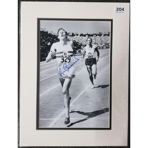 204 - ROGER BANNISTER SIGNED PHOTO WITH CERTIFICATE OF AUTHENTICITY