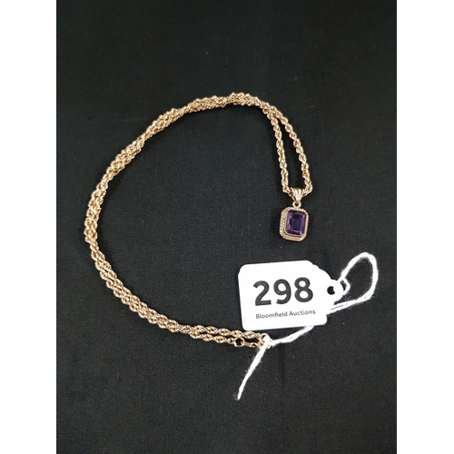 298 - 9 CARAT GOLD & AMETHYST PENDANT ON 9 CARAT GOLD CHAIN