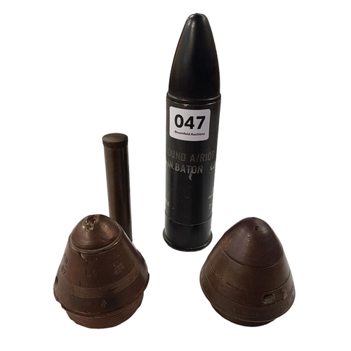 47 - 1.  ONE EARLY BATTON ROUND (DISCHARGED) WITH 
     ORIGINAL PROTECTIVE AND CASING
2.  OIL BOTTLE CAR... 