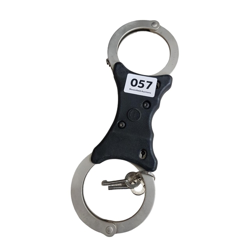 57 - ROYAL ULSTER CONSTABULARY ISSUE BELT ORDER HANDCUFFS WITH KEY