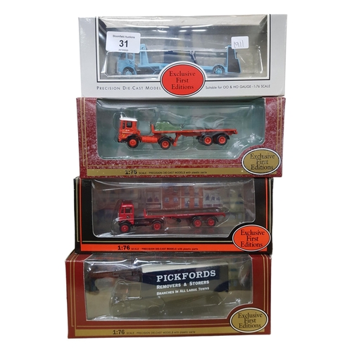 31 - 4 BOXED MODEL CARS