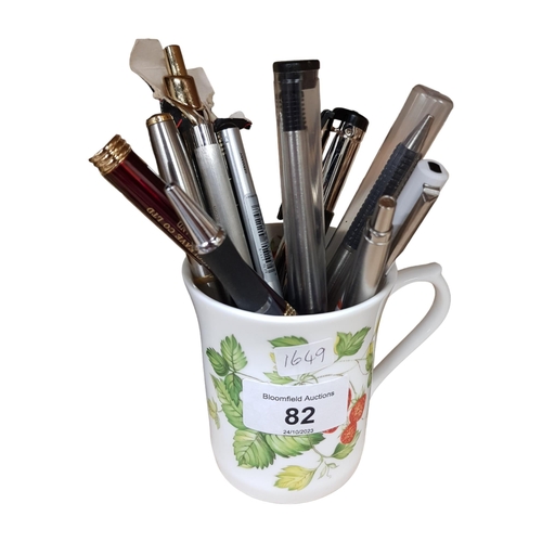 82 - MUG OF VINTAGE PENS