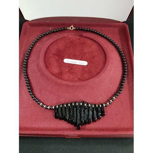 365 - VINTAGE 9 CARAT GOLD & ONYX ART DECO NECKLACE