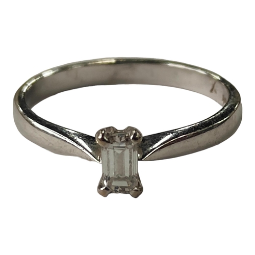 376 - 18 CARAT WHITE GOLD & DIAMOND SOLITAIRE RING - EMERALD CUT - O.35 CARAT