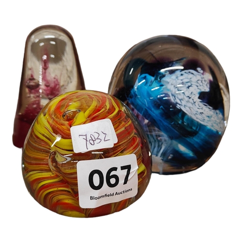 67 - 3 COLOURED GLASS PAPERWEIGHTS