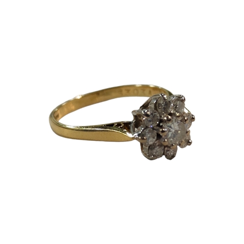 338 - 18 CARAT GOLD AND DIAMOND CLUSTER RING