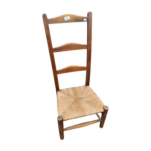 161 - ANTIQUE LADDER BACK CHAIR WITH WORKED WOVEN SEAT