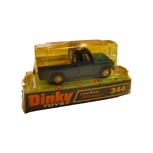 448 - BOXED DINKY MODEL 344, LANDROVER, BLUE METALLIC WITH TOW HOOK