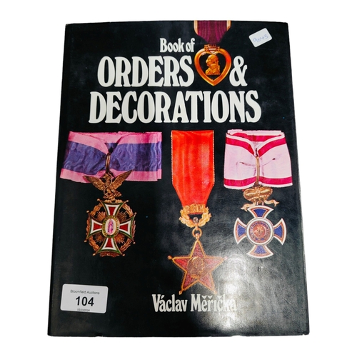 104 - BOOK OF ORDERS AND DECORATIONS