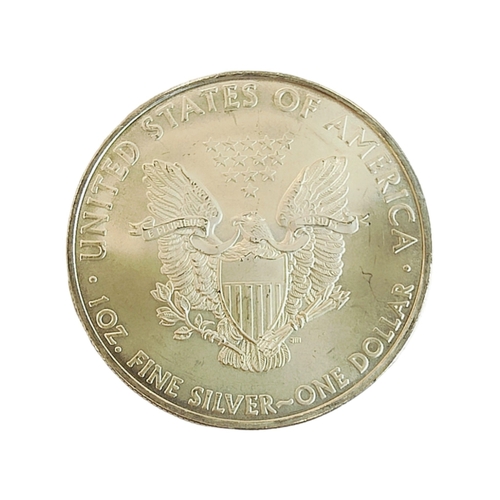 391 - 1 OZ FINE SILVER ONE DOLLAR 2010