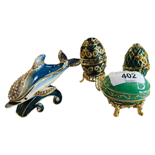 402 - 3 X ENAMEL FABERGE STYLE EGGS ON STAND AND DOLPHIN