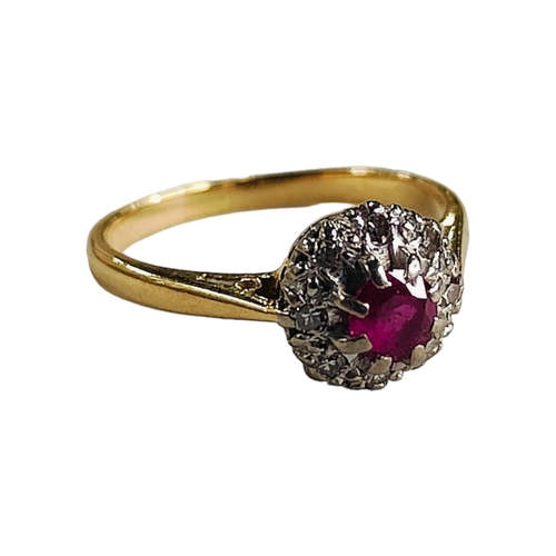 331 - 18 CARAT RUBY AND DIAMOND RING