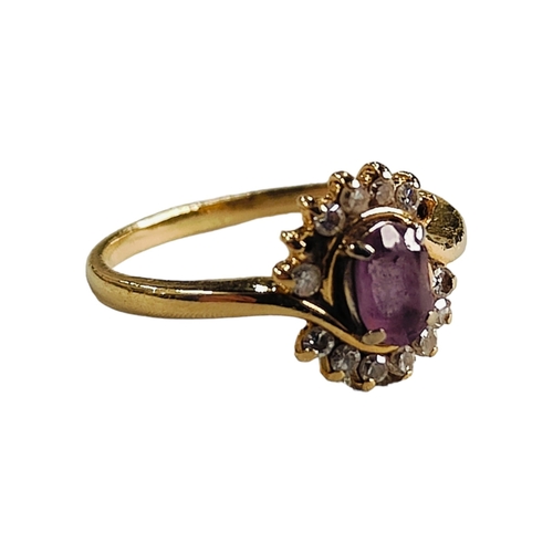 332 - 18 CARAT DIAMOND AND AMETHYST RING