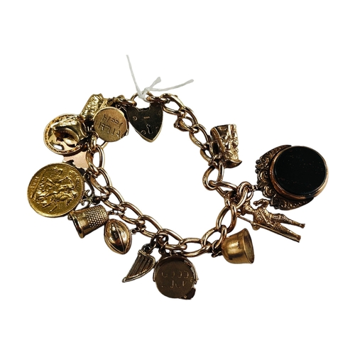 334 - GOLD CHARM BRACELET TO INCLUDE VICTORIAN SOVEREIGN 61.37G