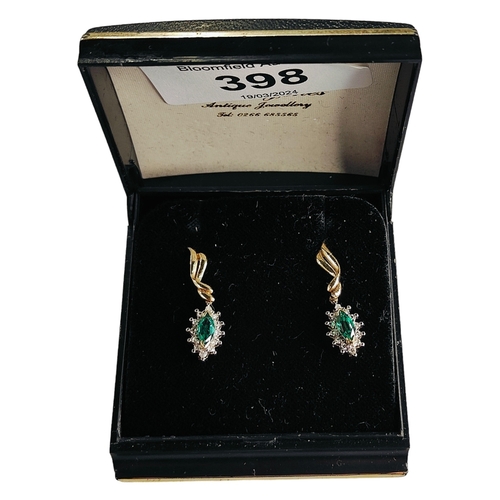 398 - 9 CARAT GOLD EMERALD AND DIAMOND EARRINGS