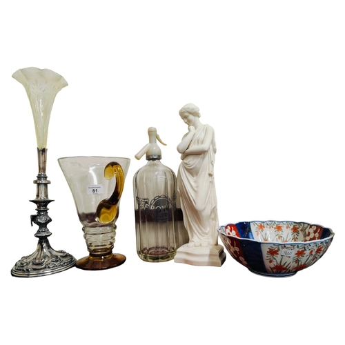 81 - SHELF LOT TO INCLUDE BELLEEK FIGURE, SODA SYPHON, TABLE CENTRE AND IMARI BOWL