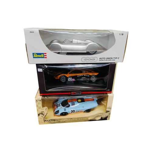 29 - 3 BOXED LARGER SCALE MODEL CARS