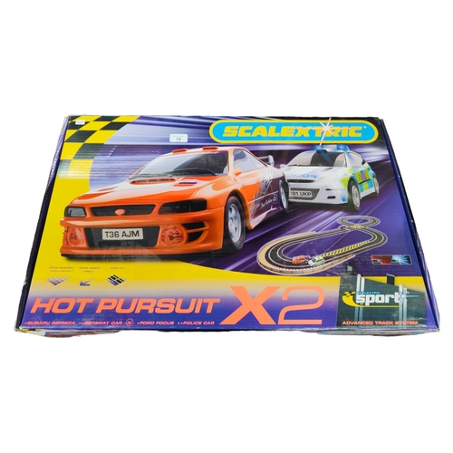 14 - NEW BOXED SCALEXTRIC HOT PURSUIT SET