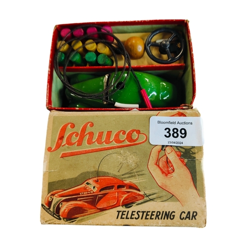 389 - GERMAN TIN PLATE SCHUCO YELESTEERING CAR IN ORIGINAL BOX