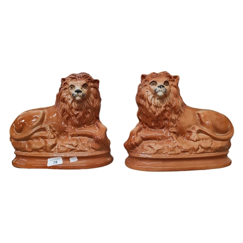 79 - PAIR OF STAFFORDSHIRE LIONS