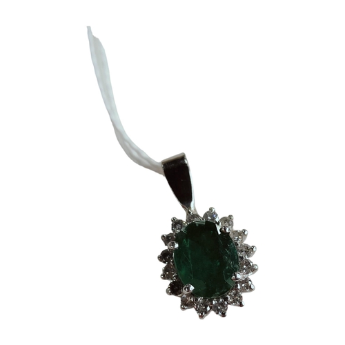 311 - 18 CARAT WHITE GOLD EMERALD & DIAMOND CLUSTER PENDANT