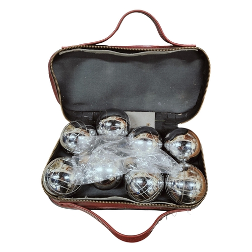 34 - SET OF VINTAGE STEEL BOULES IN CASE