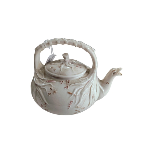 359 - 1ST PERIOD GRASS PATTERN BELLEEK TEAPOT - A NUBER OF HAIRLINE CRACKS TO HANDLE AND AROUND BASE OF HA... 