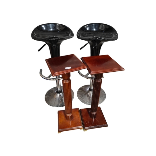 106 - 2 BAR STOOLS AND 2 MAHOGANY PLANT STANDS