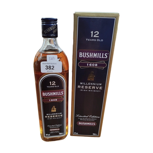 382 - BOTTLE OF BUSHMILLS MILLENIUM RESERVE IRISH WHISKEY 12 YEARS OLD